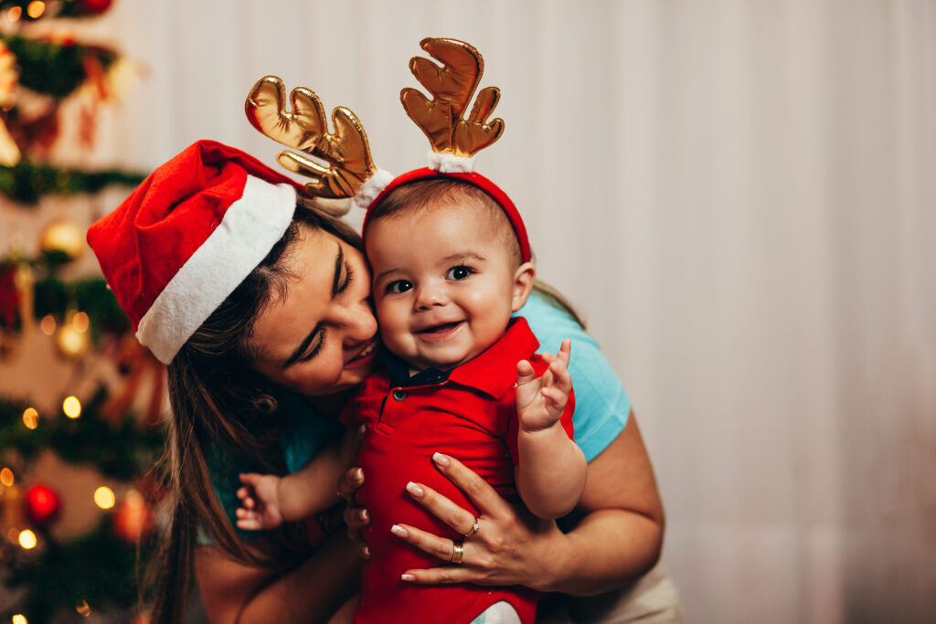 mom and baby wearing christmas outfits