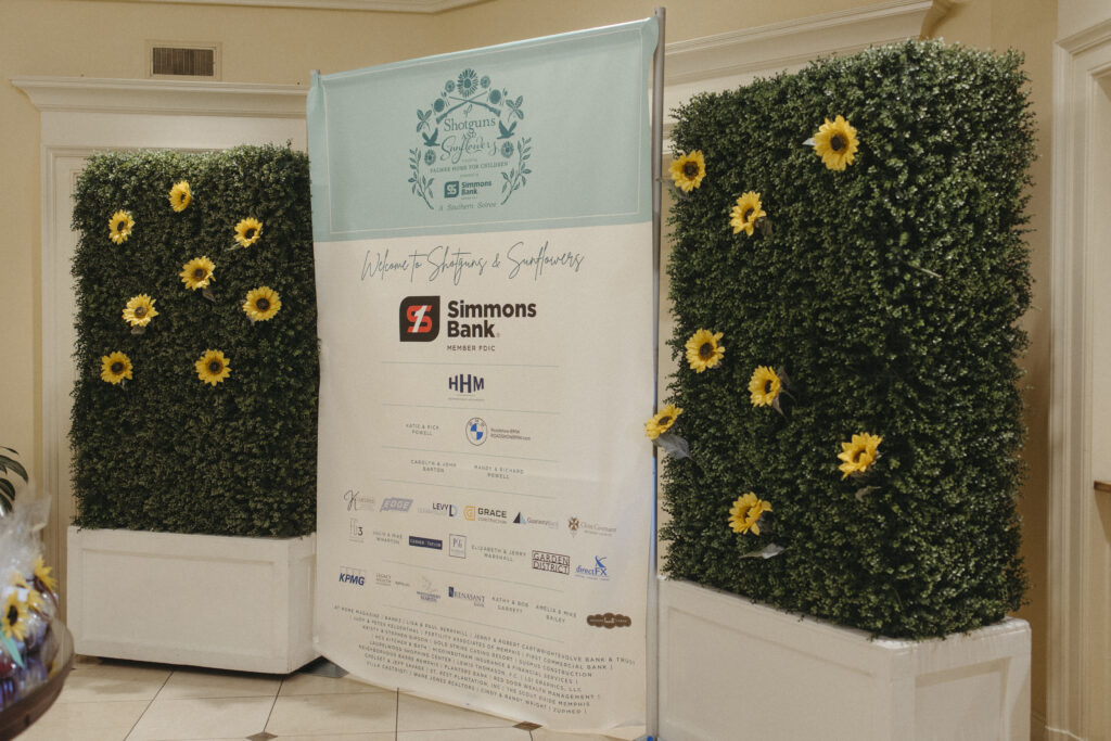 sponsor banner at the 2024 shotguns and sunflowers soiree benefiting palmer home for children held in september 2024 from the memphis country club